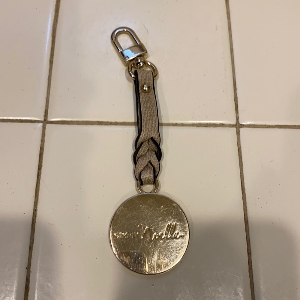 Simply Noelle bag charm used